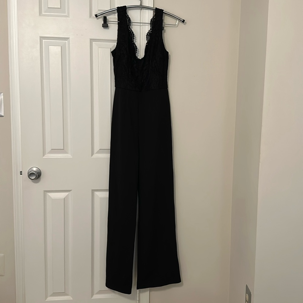 Black jumpsuit with lace top size small Francesca’s Alya brand